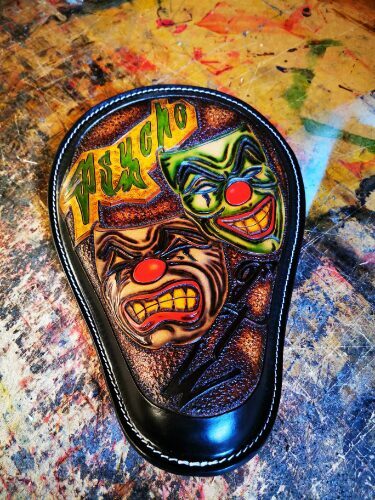 Laugh Now Cry Later Custom tooled solo seat Bobber
